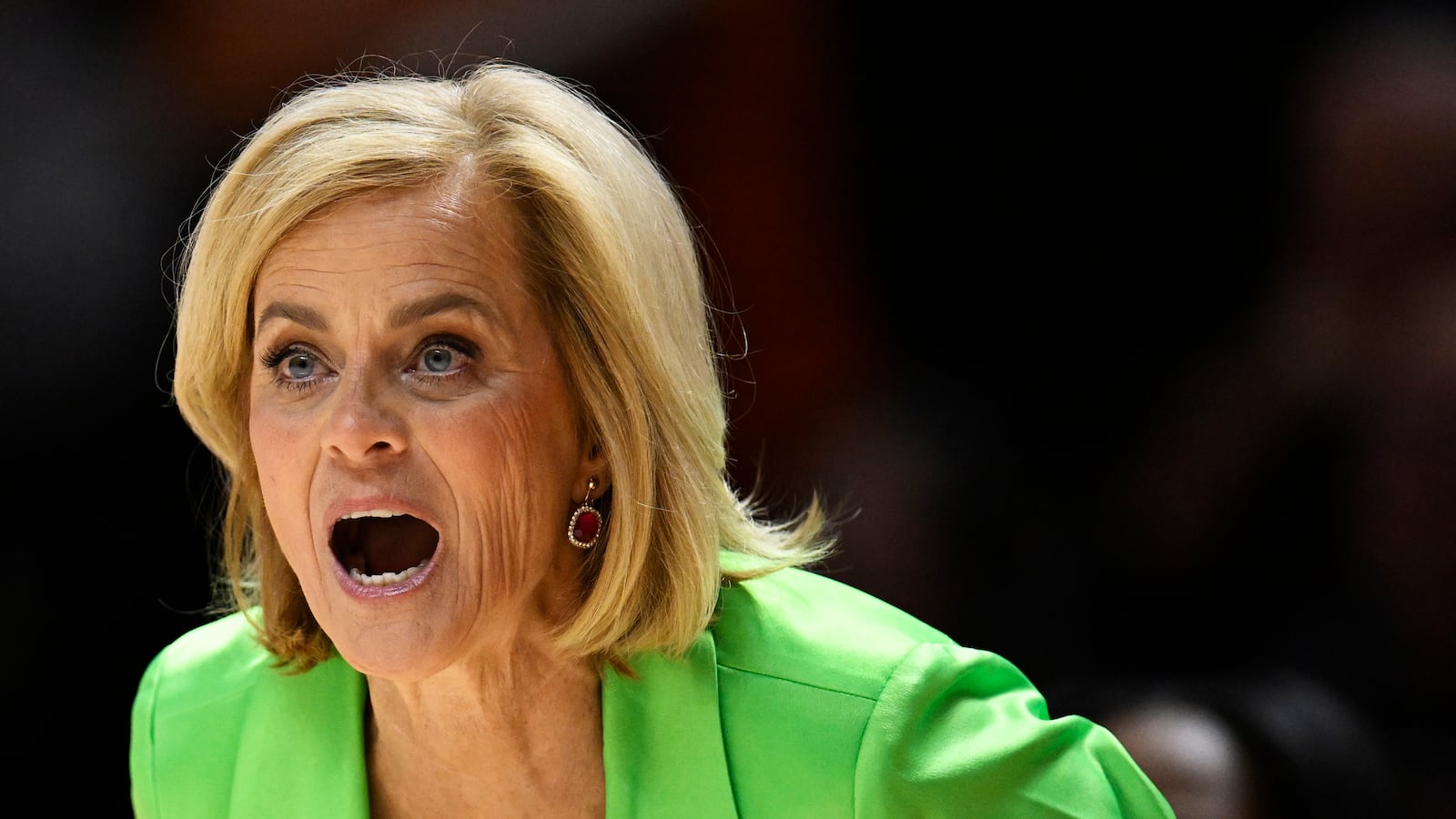 Head coach Kim Mulkey of the LSU Lady Tigers yells to her team against the Tennessee Lady Vols in the first quarter at Thompson-Boling Arena on February 25, 2024 in Knoxville, Tennessee.