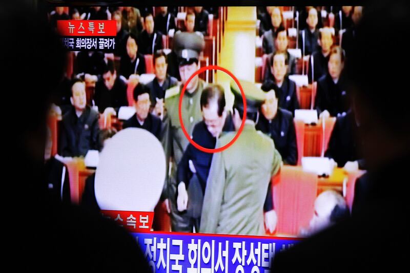 articles/2013/12/09/rare-images-show-kim-jong-un-s-uncle-being-dragged-away/131209-uncle-kimjong-cheat_kxgjdd