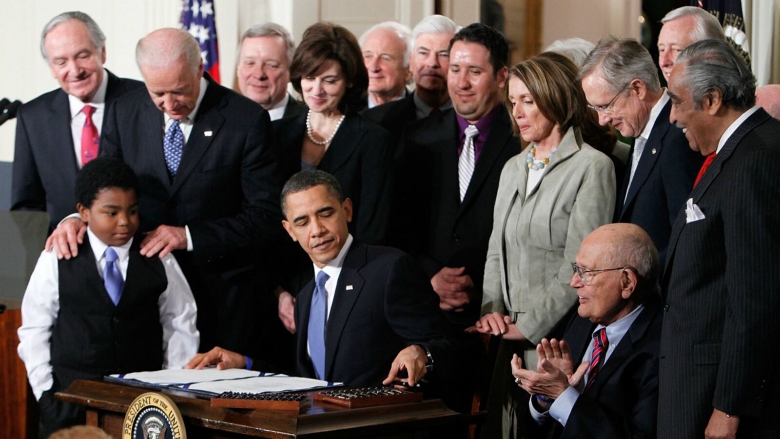 articles/2012/03/22/you-can-t-fix-medicaid-by-making-it-bigger/aca-signing_ajwi15