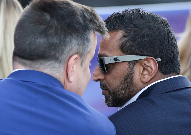 WASHINGTON, DC - JUNE 24: Acting Director of National Intelligence is Bill Pulte (L) sits with Federal Bureau of Investigation (FBI) Director Kash Patel during a rally to kick off the Great American State Fair on the National Mall on June 24, 2026 in Washington, DC. The Freedom 250-backed Great American State Fair celebrates the 250th anniversary of the United States with pavilions, live performances, military demonstrations, and exhibits and runs through July 10th. (Photo by Chip Somodevilla/Getty Images)