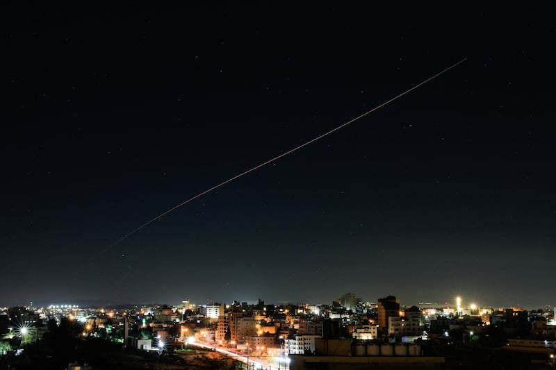 An Iranian missile flies in the sky over Israel, as seen from Hebron, in the Israeli-occupied West Bank, June 7, 2026. REUTERS/Mussa Qawasma
