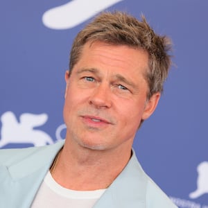 Brad Pitt attends the “Wolfs” photocall with a clean cut hairstyle during the 81st Venice International Film Festival in 2024.