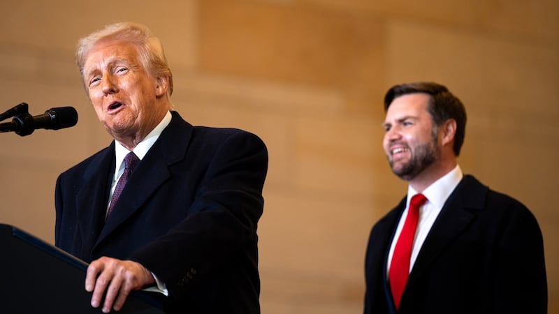 President Donald Trump speaks to the crowd as U.S. Vice President JD Vance looks on in the VIP overflow viewing area in Emancipation Hall after his inauguration at the U.S. Capitol on January 20, 2025 in Washington, DC.