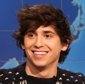 SATURDAY NIGHT LIVE -- Episode 1892 -- Pictured: (l-r) Marcello Hernández and anchor Colin Jost during Weekend Update on Saturday, December 13, 2025 -- (Photo by: Will Heath/NBC via Getty Images)