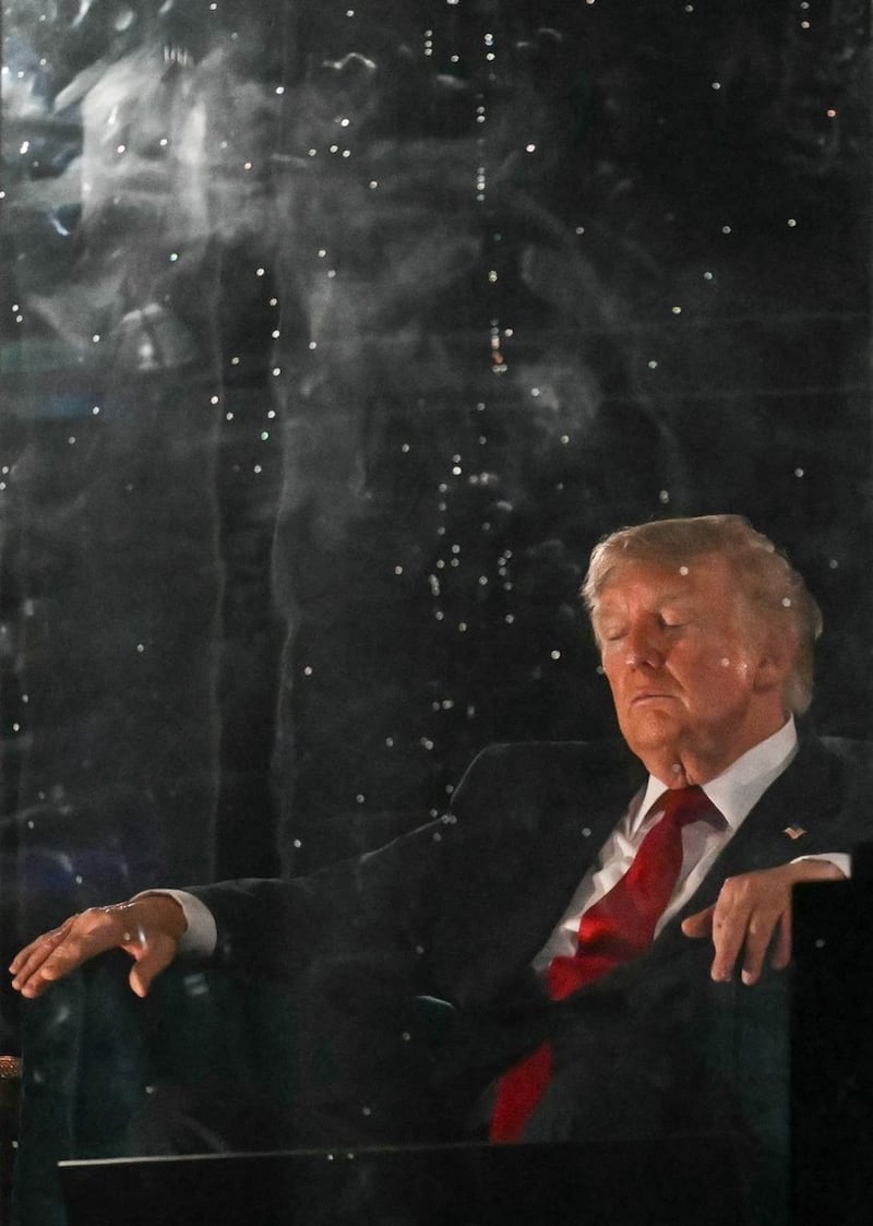 Trump appeared to be dozing off during the 40 minute fireworks extravaganza.