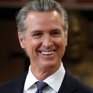 SAN FRANCISCO, CALIFORNIA - JANUARY 16: California Gov. Gavin Newsom (L) looks on with San Francisco Mayor Daniel Lurie during a press conference at Friendship House Association of American Indians on January 16, 2026 in San Francisco, California. California Gov. Gavin Newsom joined San Francisco Mayor Daniel Lurie to announce new funding for homelessness and mental health efforts in the city of San Francisco. The governor announced more than $420 million in new state funding for San Francisco, Los Angeles, and San Diego as part of the state's HHAP 6 funding, which goes toward helping local programs end homelessness through interim or permanent housing and supportive services. (Photo by Justin Sullivan/Getty Images)