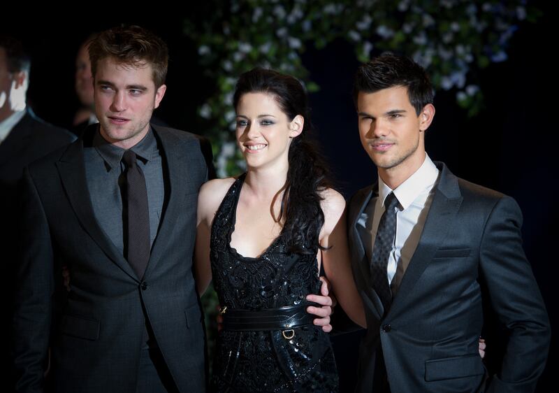 Robert Pattinson, Kristen Stewart, and Taylor Lautner.