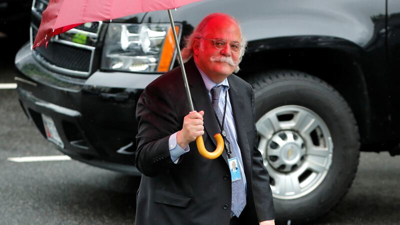 Outgoing White House attorney Ty Cobb walks to his car at the White House in Washington, U.S. May 17, 2018.