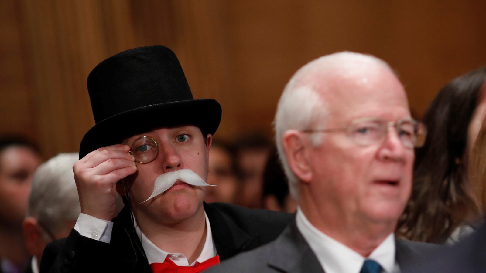 Senate_Equifax_Hearing_Protester_Dressed_As_Monopoly_Man_uzoffr