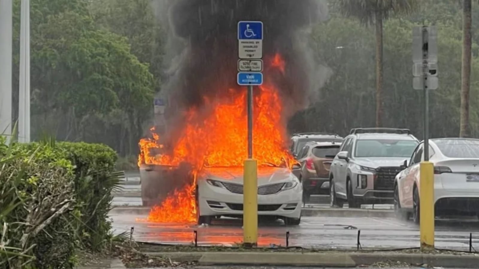 Alicia Moore’s car on fire.