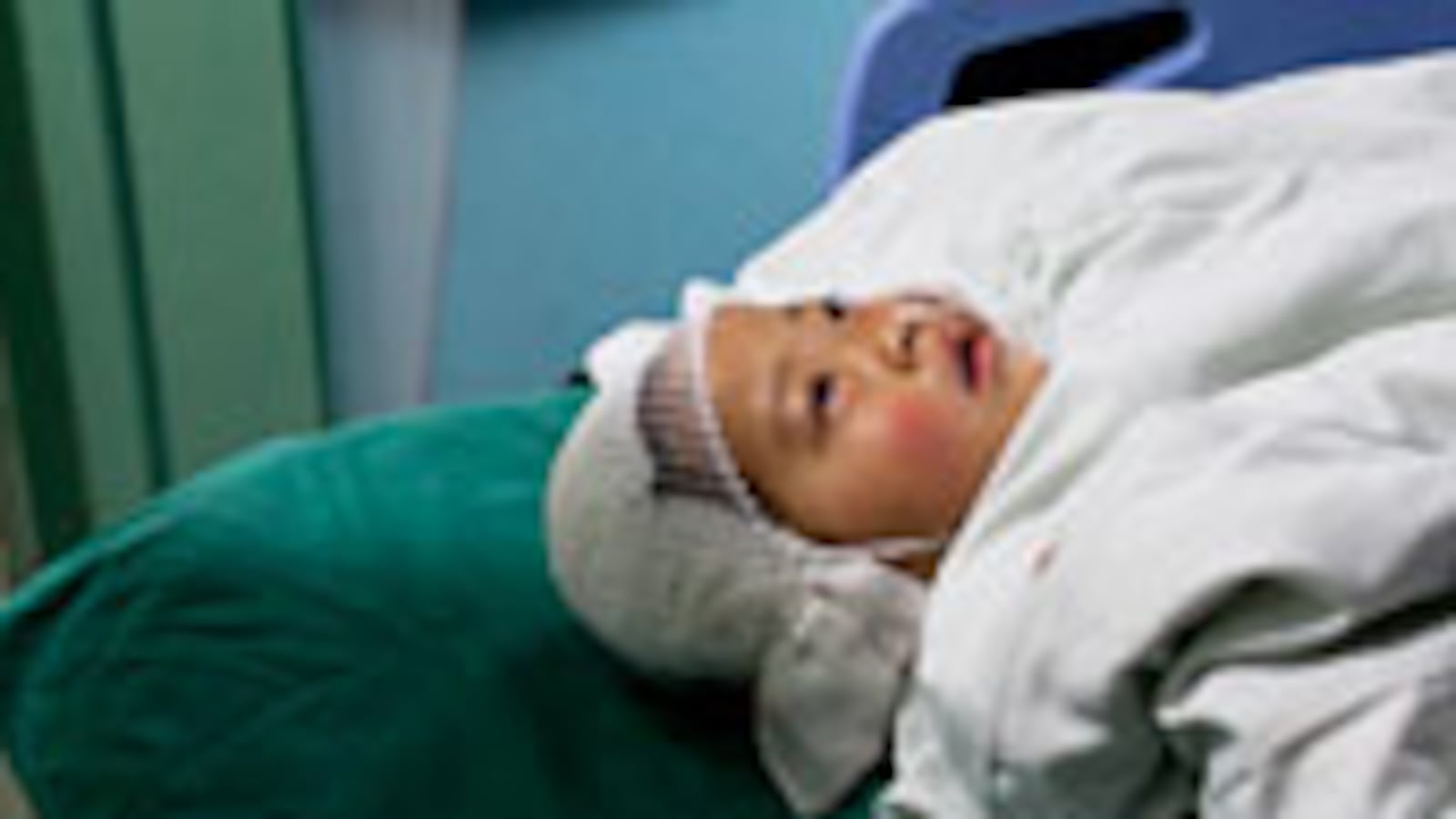 articles/2010/05/03/chinas-schoolhouse-murder-mystery/hung-china-kids_97620_y8mmxi