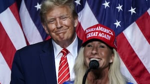 Marjorie Taylor Greene (R) speaks alongside Donald Trump at a campaign event in Rome, Georgia, on March 9, 2024.