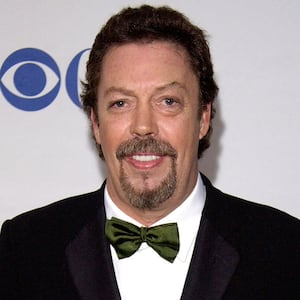 FILE PHOTO: British actor Tim Curry poses for photographers as he arrives for the American Theatre Wing's 59th Annual Tony Awards at Radio City Music Hall in New York, June 5, 2005. REUTERS/Chip East/File Photo