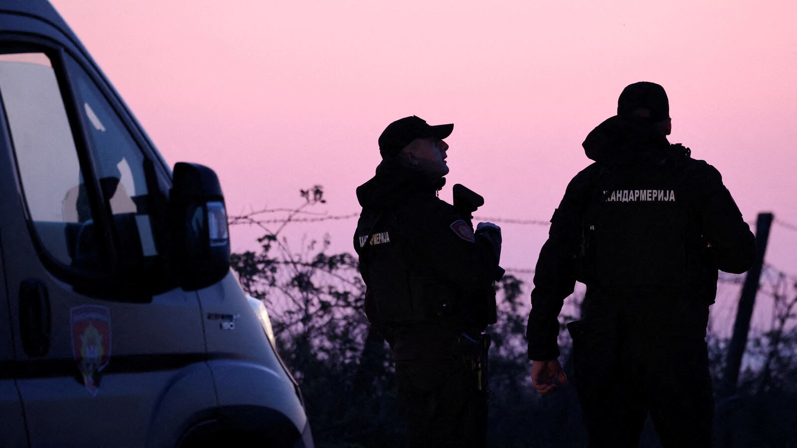 Police operate a checkpoint in the aftermath of a shooting in Dubona, Serbia, May 5, 2023.