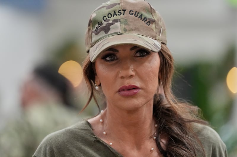 Kristi Noem helps serve sailors and coast guardsmen at Naval Support Activity on May 24, 2025 in Bahrain.