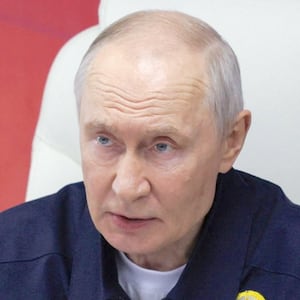 Russian President Vladimir Putin chairs a meeting on board of a missile cruiser “Varyag” in Russia's far eastern Sakhalin Region, Russia, August 12, 2026.