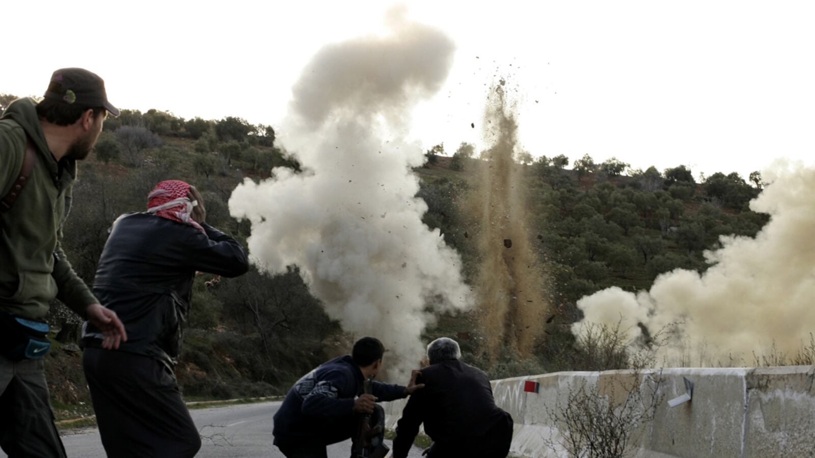 cheats/2012/03/23/thousands-protest-assad-in-damascus/syria-fighting-protests-cheat_te6zh5