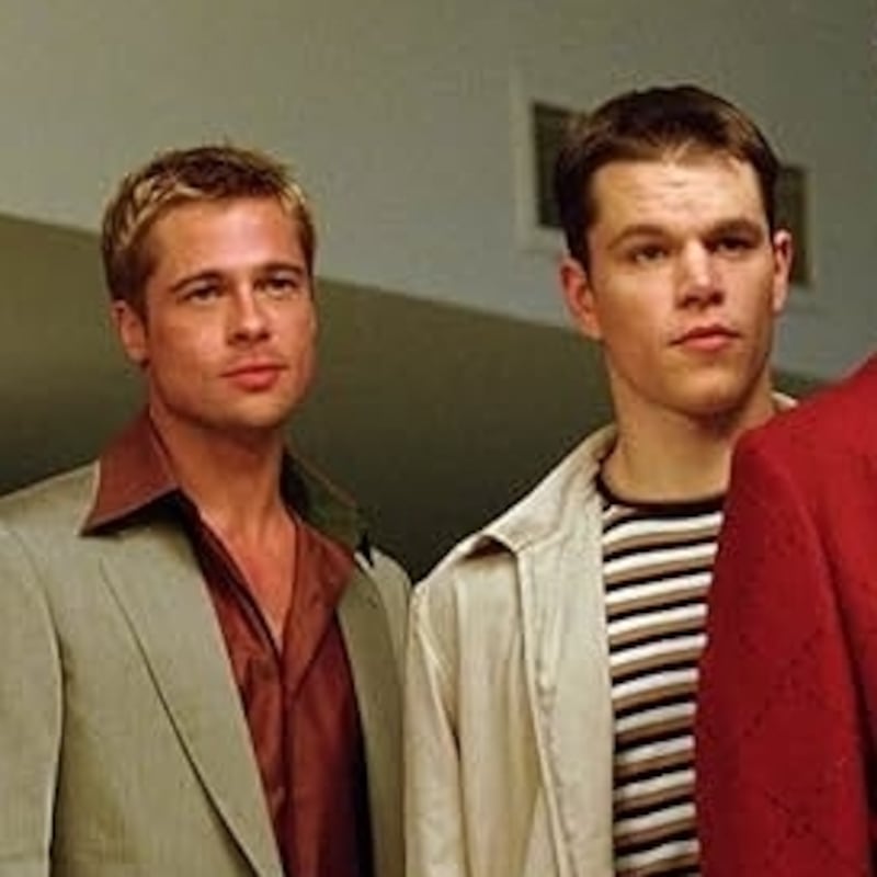 Matt Damon and Brad Pitt appear in a scene from the 2001 film ‘Oceans 11’ with cast members George Clooney, Don Cheadle, and Elliott Gould.