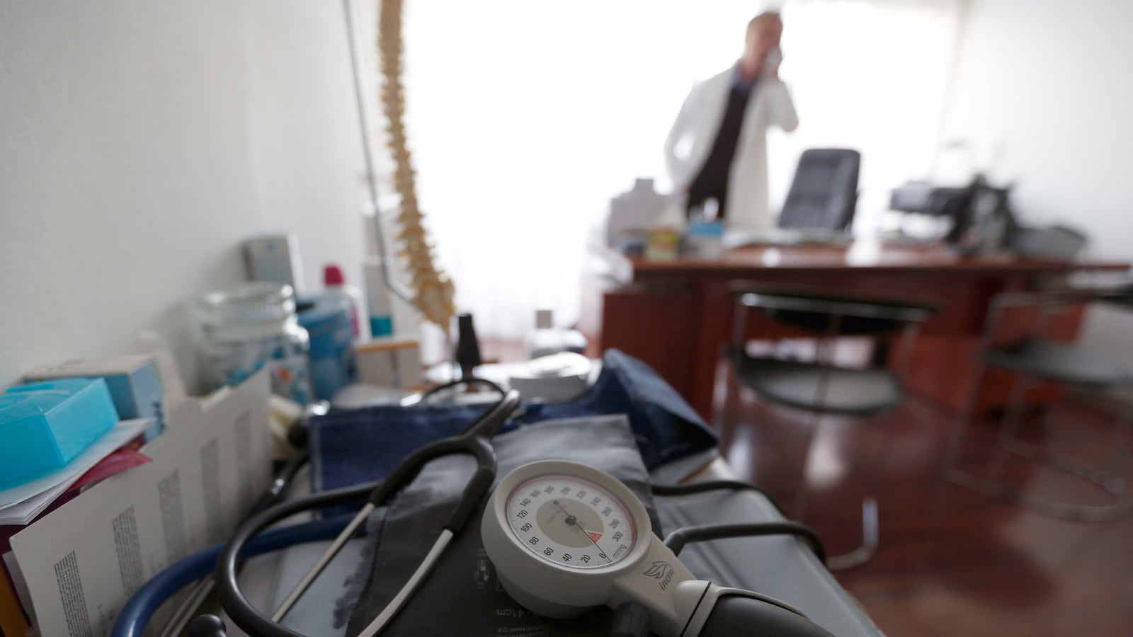 A photo illustration shows a stethoscope and blood-pressure machine as a French general practitioner works in a doctor's office in Bordeaux January 7, 2015.