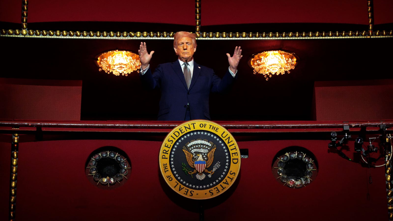 WASHINGTON, DC - MARCH 17: U.S. President Donald Trump looks down from the Presidential Box in the Opera House at the John F. Kennedy Center for the Performing Arts as he participates in a guided tour and leads a board meeting on March 17, 2025 in Washington, DC. After shunning the annual Kennedy Center Honors during his first term in the White House, Trump fired the center’s president, removed the bipartisan board of Biden appointees, and named himself Chairman of the storied music, theater, and dance institution.