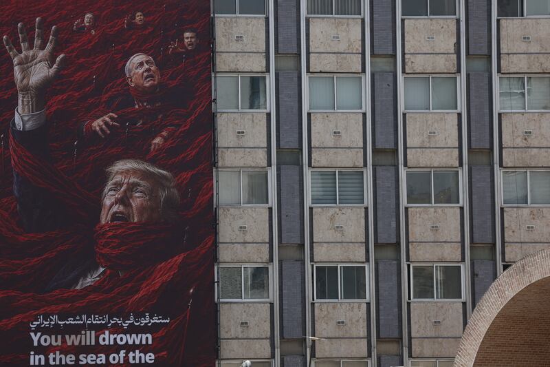 A billboard depicting U.S. President Donald Trump and Israeli Prime Minister Benjamin Netanyahu on a building in Tehran, Iran, July 21, 2026. Majid Asgaripour/WANA (West Asia News Agency) via REUTERS ATTENTION EDITORS - THIS PICTURE WAS PROVIDED BY A THIRD PARTY. ISRAEL OUT. NO COMMERCIAL OR EDITORIAL SALES IN ISRAEL. NO ACCESS FOR ISRAELI MEDIA. NO USE BBC PERSIAN. NO USE VOA PERSIAN. NO USE MANOTO. NO USE IRAN INTERNATIONAL. NO USE RADIO FARDA. DIGITAL: NO USE BBC PERSIAN. NO USE VOA PERSIAN. NO USE MANOTO. NO USE IRAN INTERNATIONAL. NO USE RADIO FARDA. ISRAEL OUT. NO COMMERCIAL OR EDITORIAL SALES IN ISRAEL