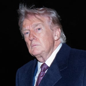 U.S. President Donald Trump walks as he arrives back at the White House in Washington, D.C., U.S., March 15, 2026.