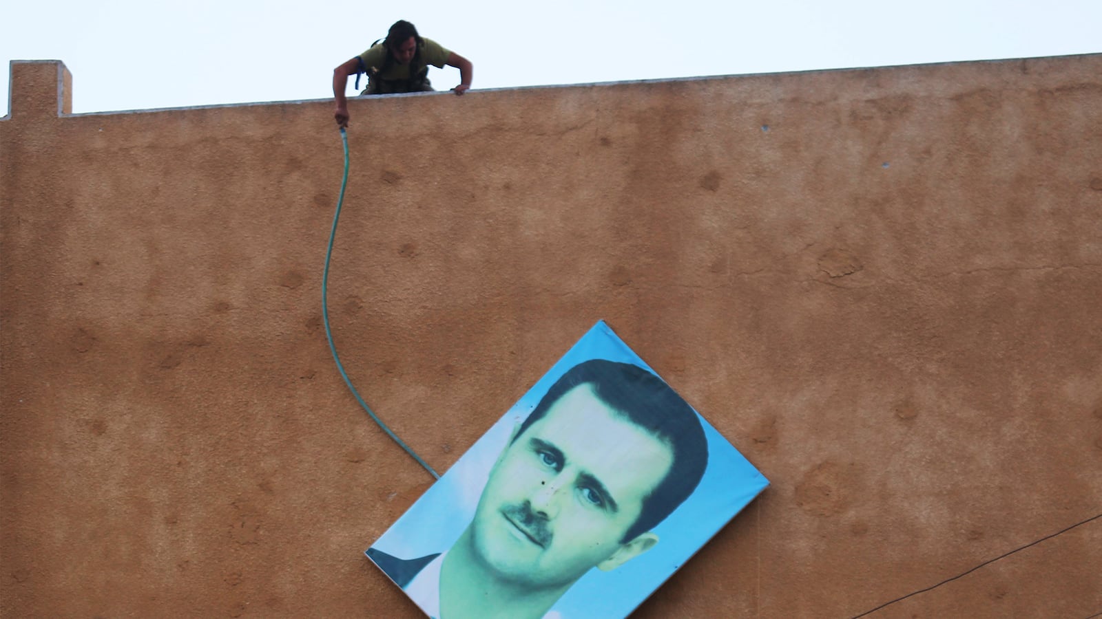 articles/2015/06/03/un-envoy-to-syria-assad-must-go/150602-siegel-assad-tease_i00ao1