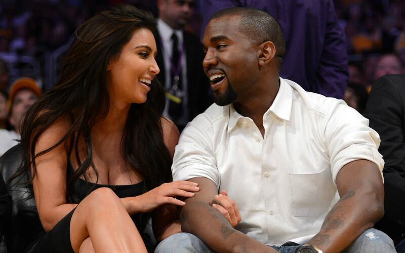 articles/2013/10/22/kanye-west-proposes-to-kim-kardashian-charlie-hunnam-talks-50-shades-exit/kanye-and-kim-are-adorable-tease_imxlbb