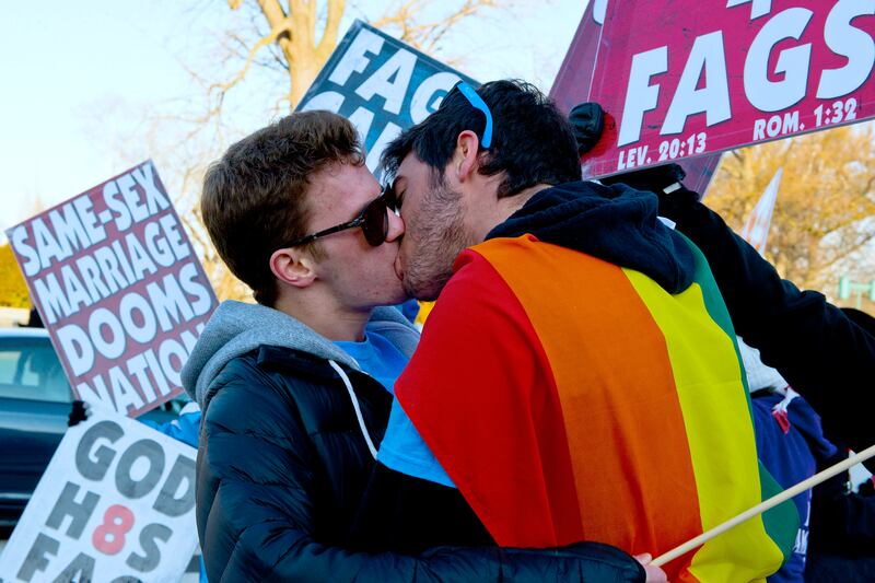 galleries/2013/03/26/scotus-marriage-equality-rallies/130327-marriage-equailty-westboro-kiss_osonkt