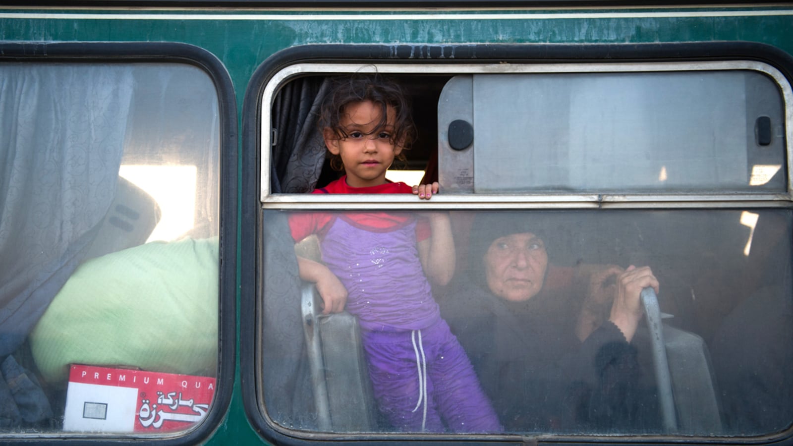 articles/2012/08/17/a-waiting-game-for-rebels-and-residents-in-syrian-border-towns/syria-border-crossing-banco_sh3y2c