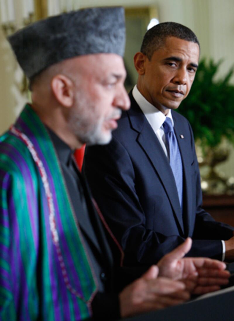 galleries/2010/06/16/awkward-presidential-encounters/awkward-prez-encounters---karzai-obama_trqylc