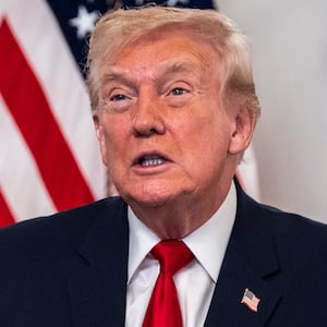 President Donald Trump participates in a call with U.S. service members from his Mar-a-Lago club in Florida on Thanksgiving Day on November 27, 2025 in Palm Beach, Florida.