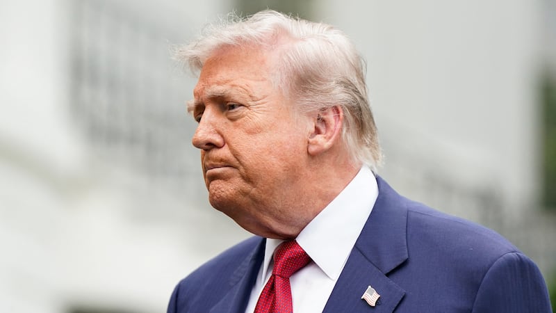 U.S. President Donald Trump looks on as he talks to reporters at the White House in Washington, D.C., U.S., May 8, 2026. REUTERS/Elizabeth Frantz