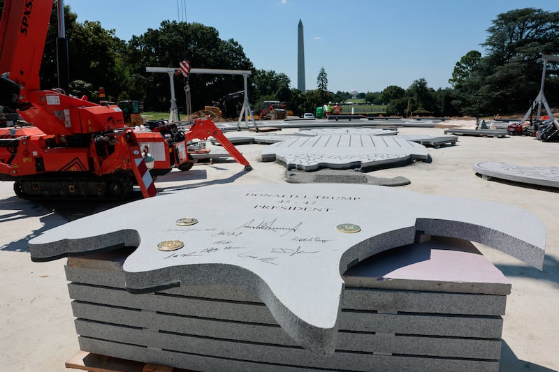 Stone that will be inserted into the helipad being constructed on the South Lawn, after it was signed by President Donald Trump, at the White House on August 19, 2026.