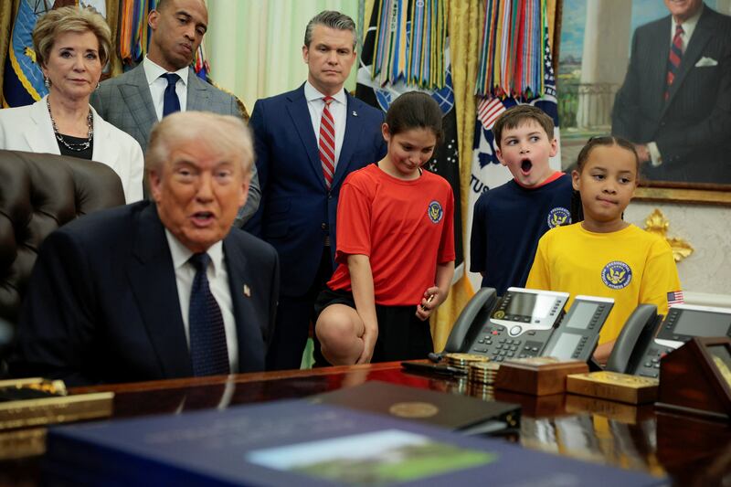 U.S. President Donald Trump, U.S. Education Secretary Linda McMahon, U.S. Department of Housing and Urban Development Secretary Scott Turner, and U.S. Secretary of Defense Pete Hegseth in the Oval Office at the White House in Washington, D.C., U.S., May 5, 2026.