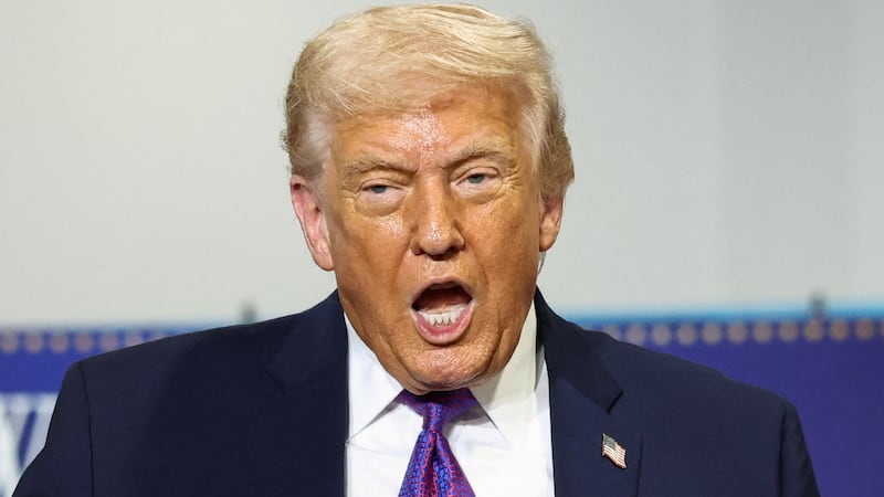 U.S. President Donald Trump gestures during a visit to Verst Logistics in Hebron, Kentucky, U.S., March 11, 2026.
