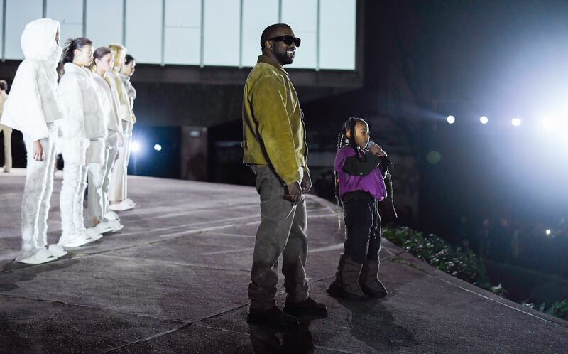 Kanye West and North West on the catwalk (Photo by WWD/Penske Media via Getty Images)
