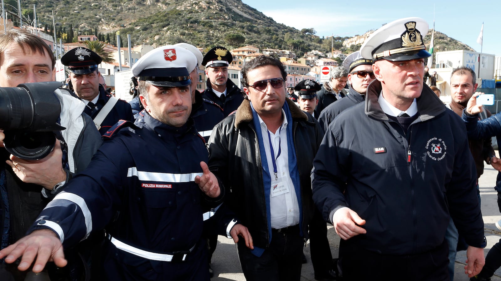 articles/2014/02/27/captain-schettino-returns-to-costa-concordia-crime-scene/140227-schettino-back-on-board-tease_qcndwf