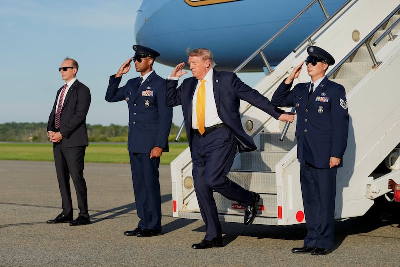 Trump sported noticeably darker locks on Friday.