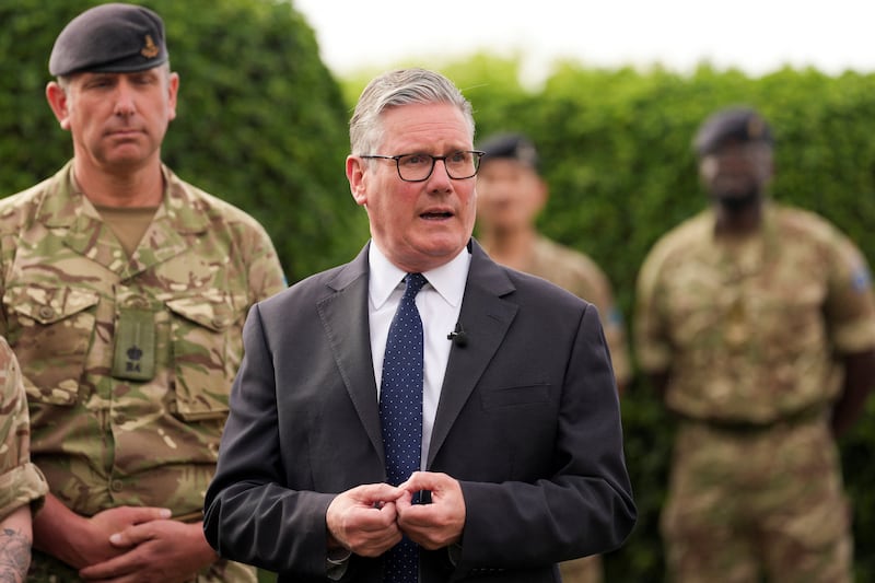 Britain's Prime Minister Keir Starmer meets aircrew members at Taif Airbase, Saudi Arabia, April 8, 2026.