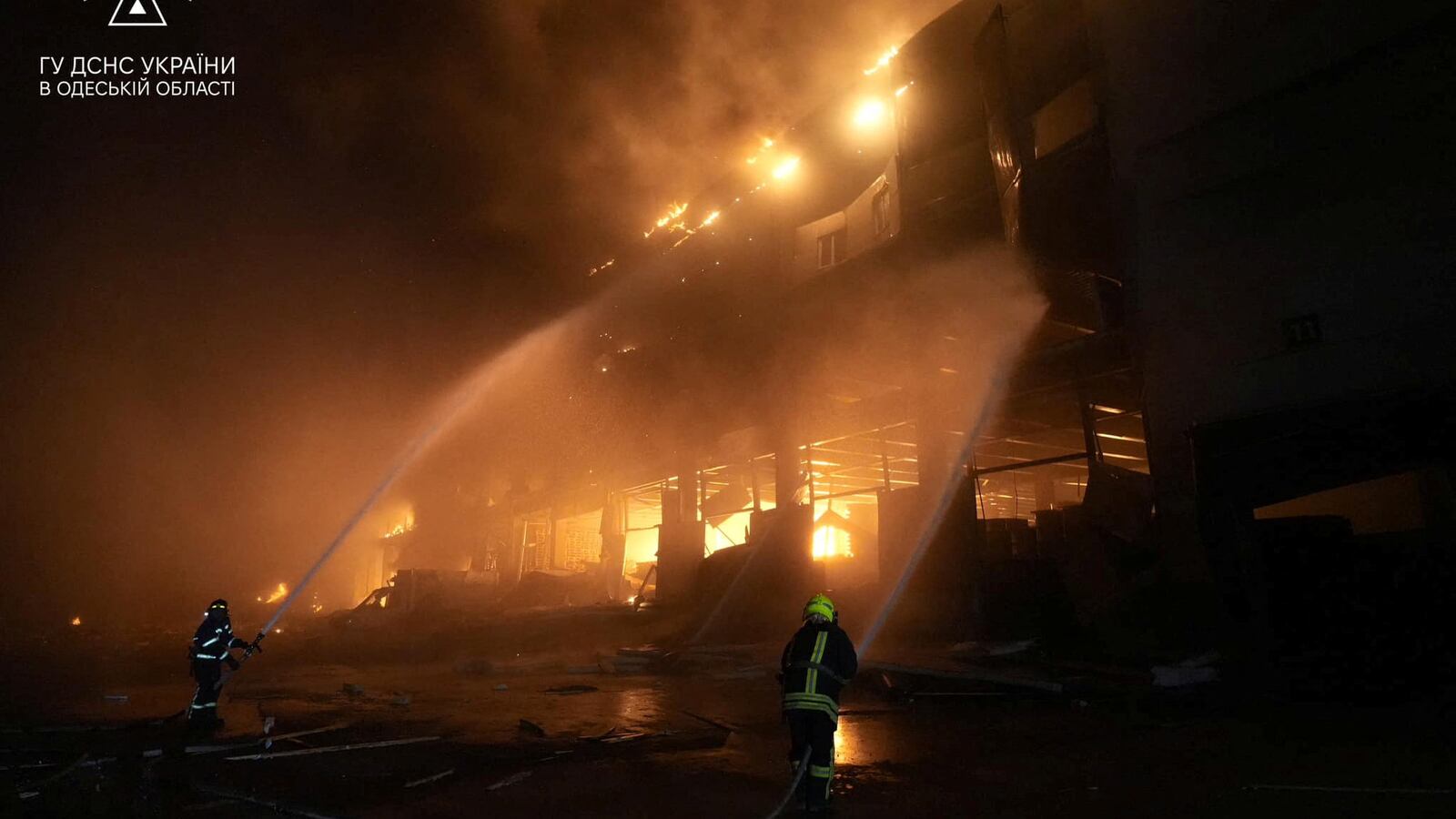 Firefighters work at the site where storage facilities were heavily damaged by a Russian missile strike in Odesa region, Ukraine, May 8, 2023.