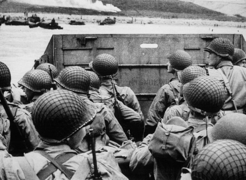 American assault troops look out towards the fighting already under way ahead of them as they approach the French coast during the massive D-Day invasion on June 6, 1944.