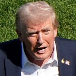 U.S. President Donald Trump gestures during the Ryder Cup at Bethpage Black Golf Course in Farmingdale, New York,  U.S., September 26, 2025. REUTERS/Elizabeth Frantz