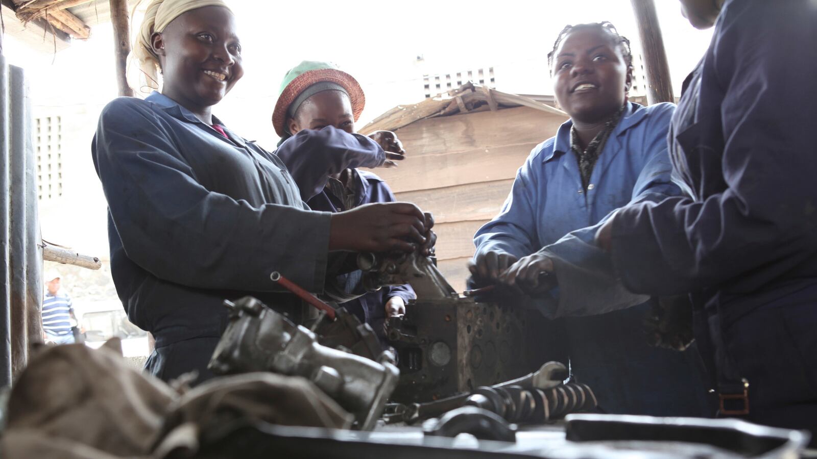 galleries/2014/06/06/victims-no-more-congo-s-badass-women-mechanics-photos/140605-congo-mechanics4_krc2yf