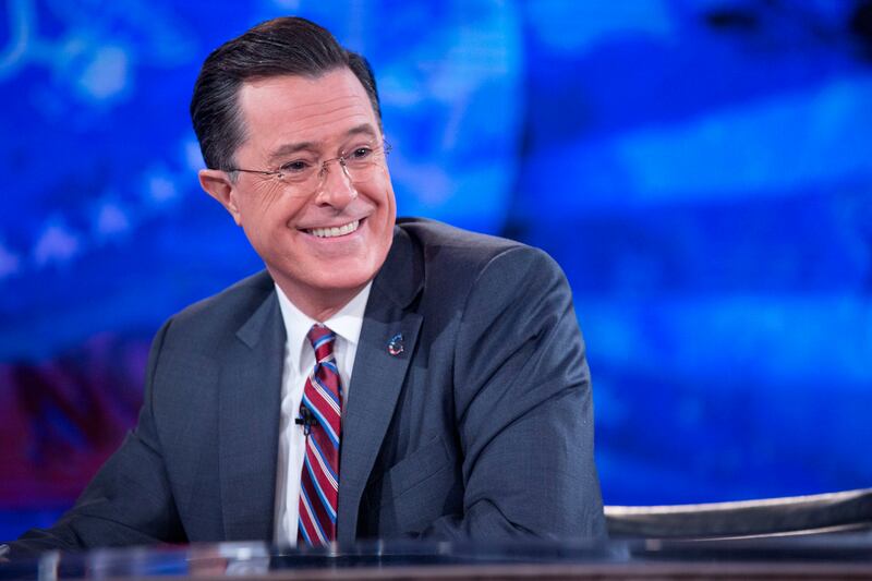 elevision personality Stephen Colbert during a taping of Comedy Central's "The Colbert Report" with U.S. President Barack Obama