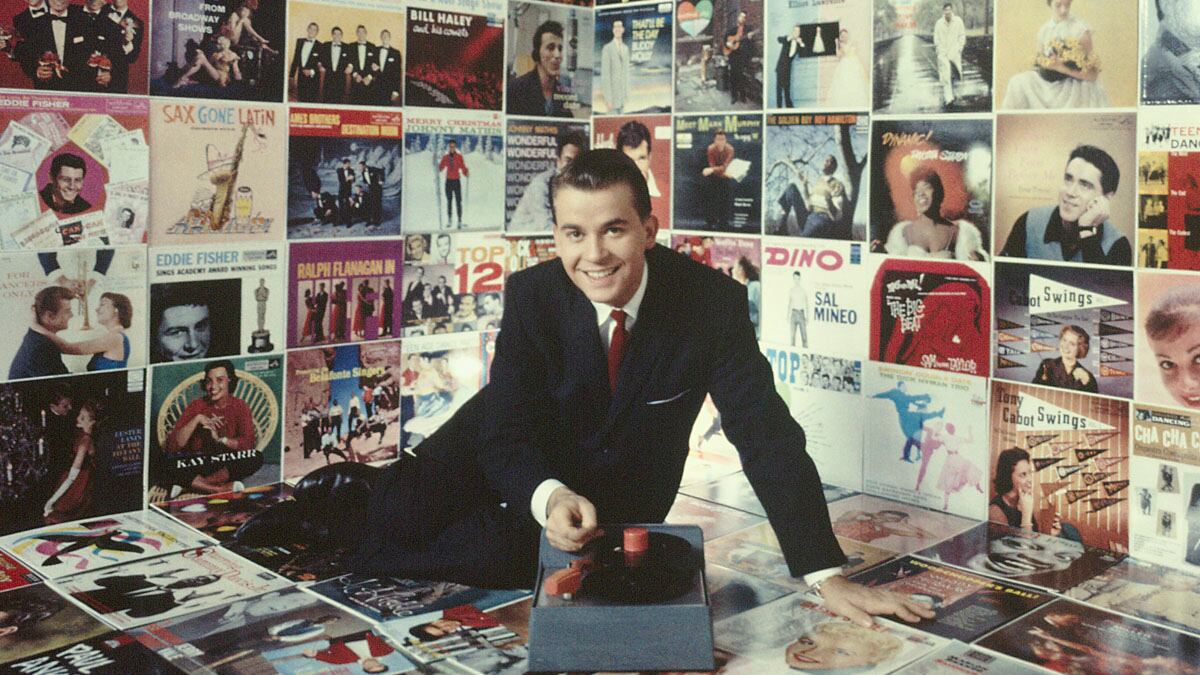 galleries/2012/04/18/remembering-dick-clark-classic-images-of-a-tv-icon-photos/classic-dick-clark-tease_gwvid6