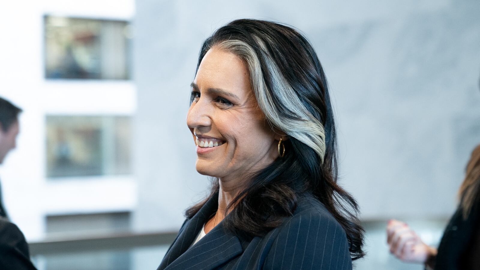 Former US Representative Tulsi Gabbard, President-elect Donald Trump's nominee for Director of National Intelligence, arrives to meet with US Senators on Capitol Hill in Washington, DC, on January 9, 2025.