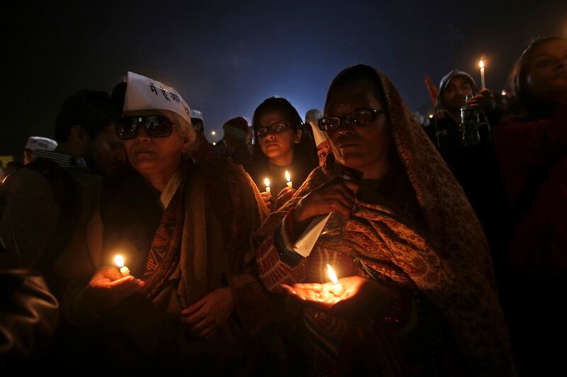 articles/2012/12/22/a-nation-of-onlookers-india-s-violence-against-women-and-america-s-guns/india-rape-dsouza-tease_veg7c5