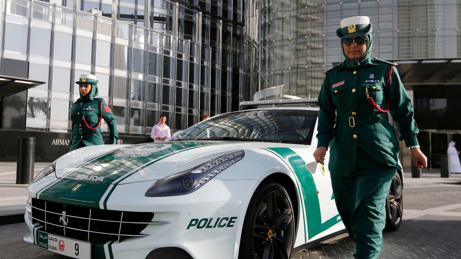 A picture of a police officer walking near a Ferrari police car in Dubai. Tierra Young Allen, 29, was reportedly arrested in May in the United Arab Emirates for publicly yelling at an employee of a rental car agency.