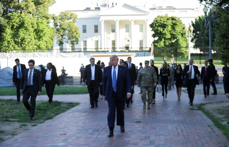 U.S. President Donald Trump walks through Lafayette Park to visit St. John's Episcopal Church across from the White House during ongoing protests over racial inequality in Washington, June 1st, 2020.